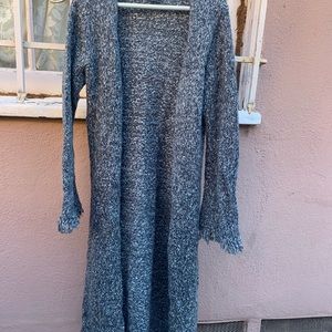 Bebe long cardigan. Used. Woven material. Blue and whites. Size large. Dry clean